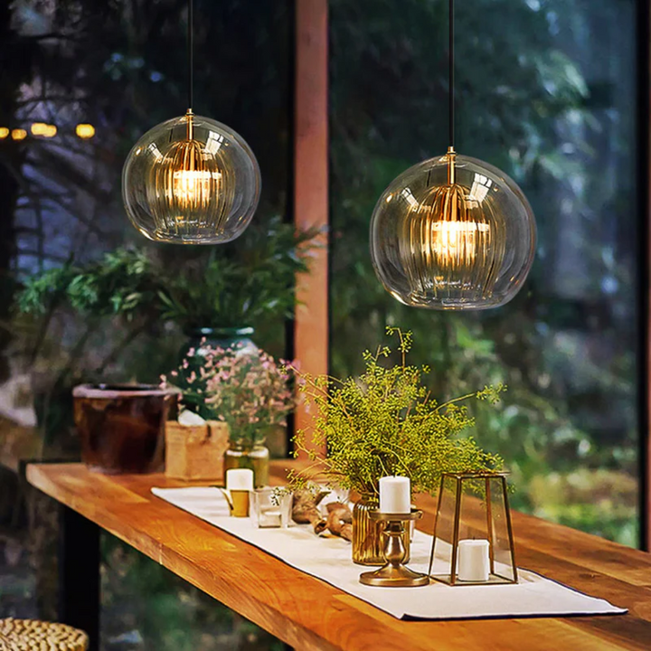 Sleek Aurora Sphere LED pendant light, a modern spherical ceiling fixture.