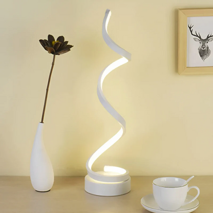 Elegant white spiral LED table lamp, dimmable, offers eye comfort and energy-efficient ambient light.