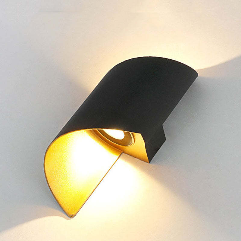 Modern spiral LED wall light, perfect for adding sophisticated accent lighting.