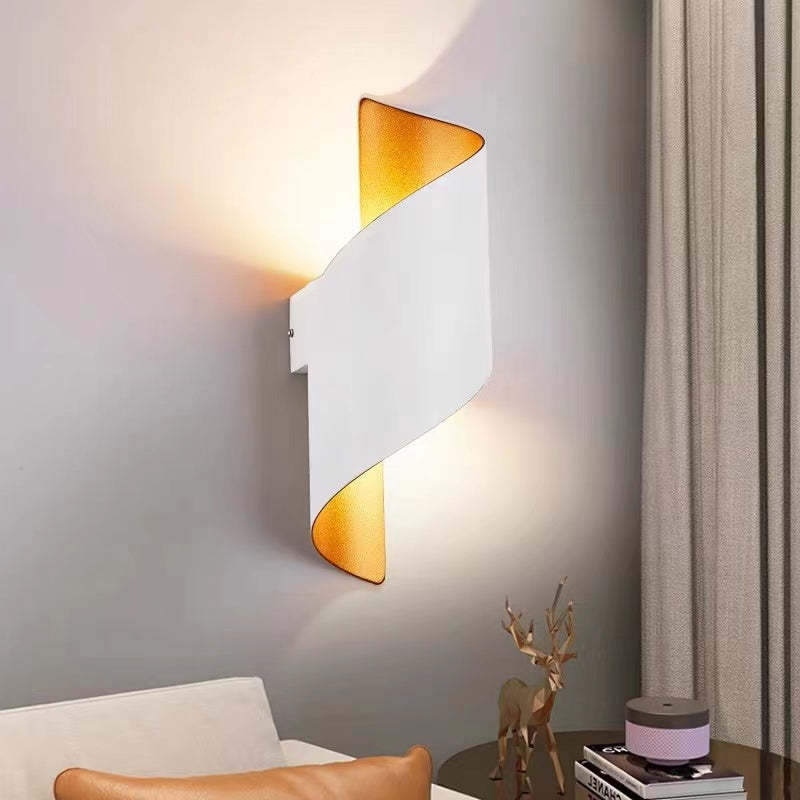 Sleek modern spiral LED wall lamp, enhancing contemporary home interiors.