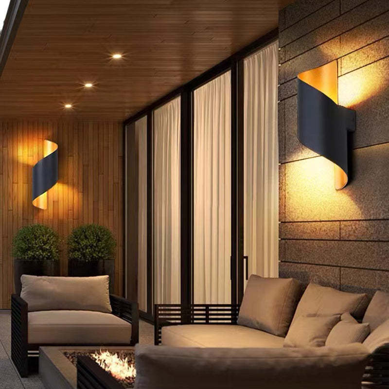 Sleek modern spiral LED wall sconce, perfect for contemporary indoor lighting.