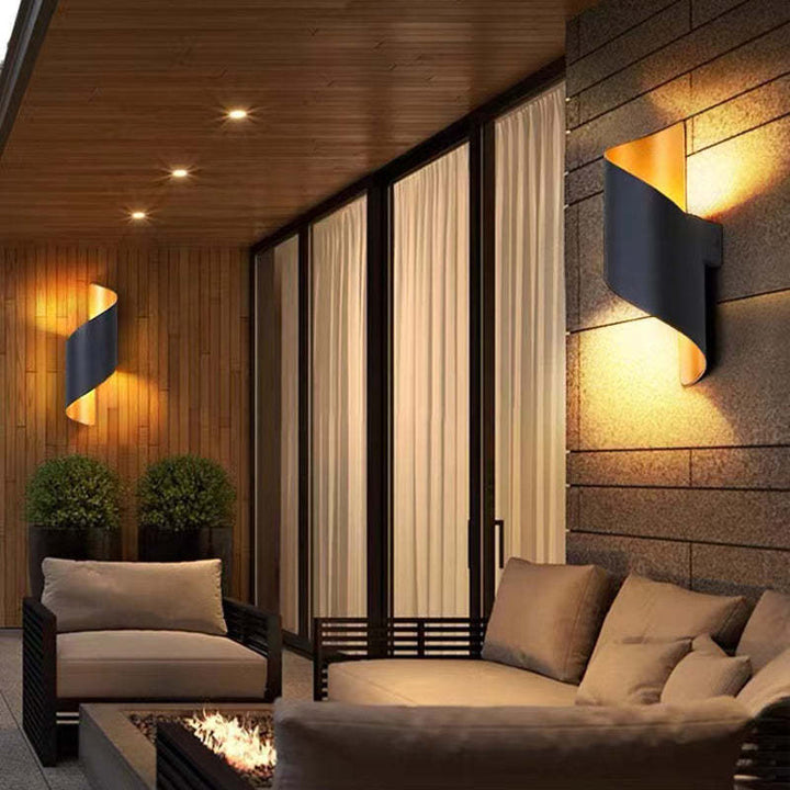 Sleek modern spiral LED wall sconce, perfect for contemporary indoor lighting.