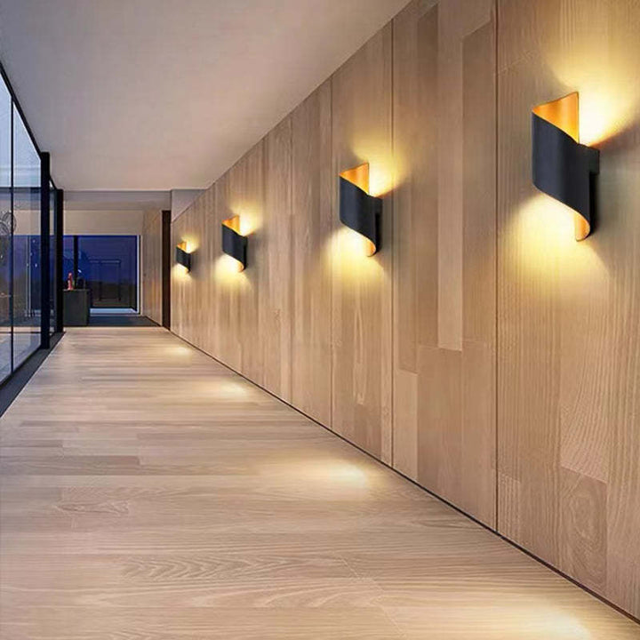 Contemporary spiral LED wall light, great for both indoor & outdoor modern lighting.