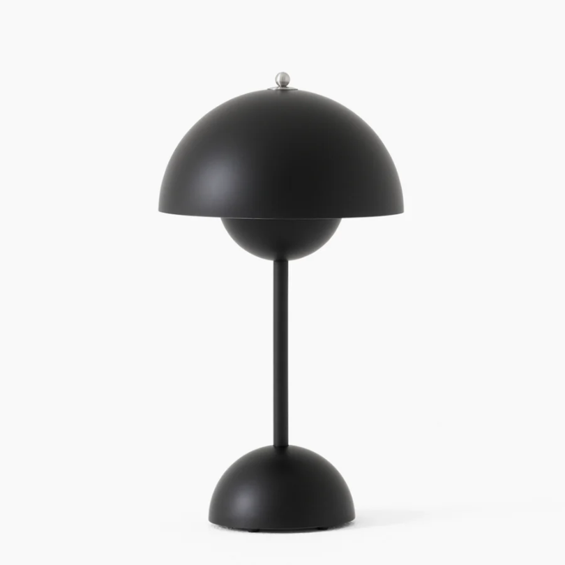 Stylish modern touch lamp providing ambient lighting for living room.