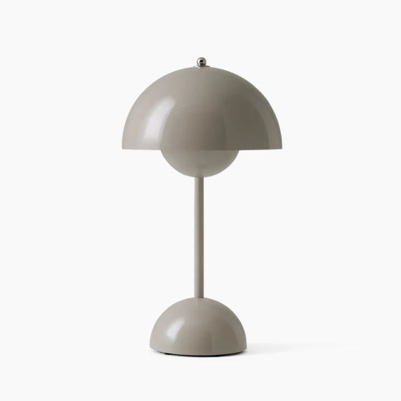Adjustable LED table lamp, touch sensitive for modern ambient home light.