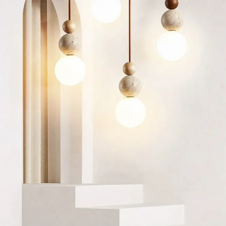 Contemporary design pendant lamp with natural travertine and mahogany for elevated home decor. Modern ceiling fixture.
