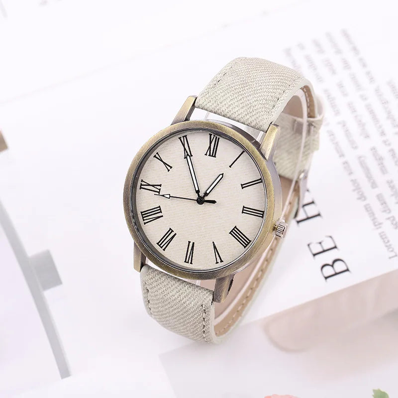 The perfect unisex denim watch: modern, casual, with a stylish denim strap and classic bronze case. Fashionable.