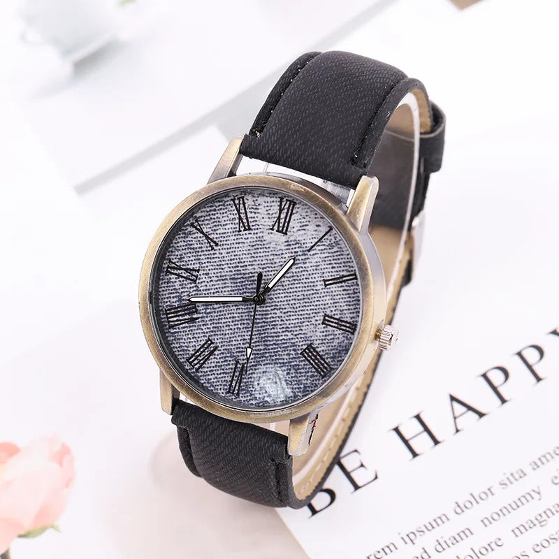 Bronze case unisex wristwatch with a blue denim strap, embodying modern street style and a casual fashion aesthetic.