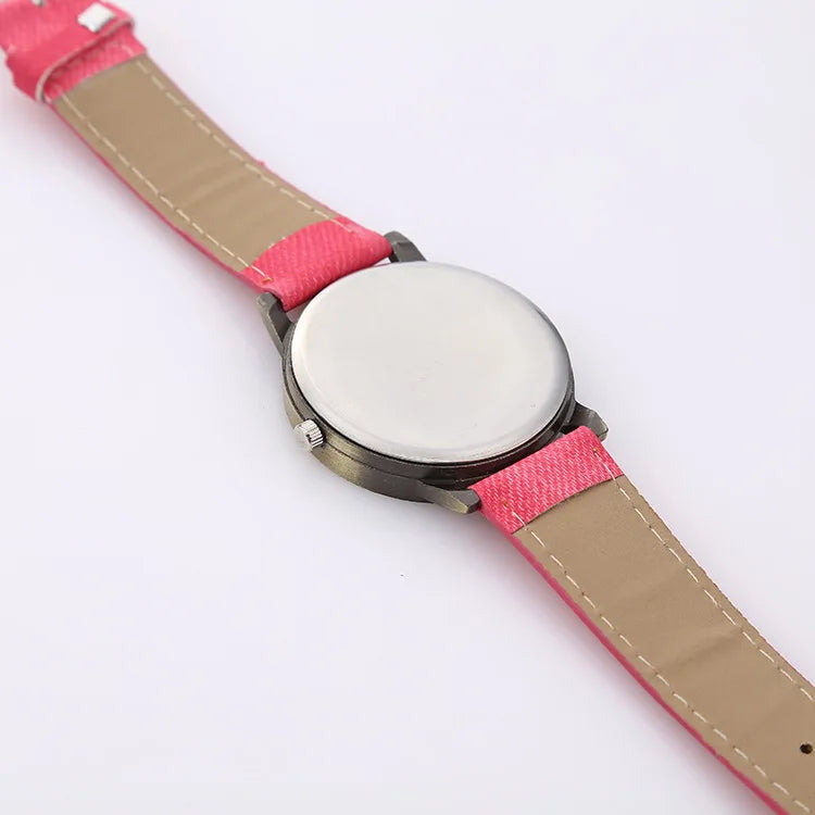 Unisex Tokyo watch with a distinct denim strap and bronze case, combining modern design with casual streetwear appeal.