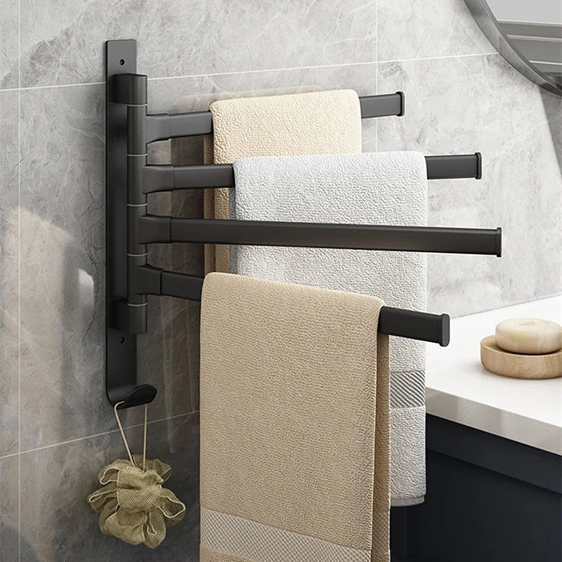 Modern wall-mounted bathroom rack with multiple swivel arms, ideal for space-saving towel storage.