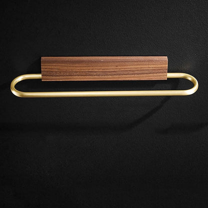 Wall-mounted modern walnut towel holder with brass detailing, ideal for organizing bathroom towels.