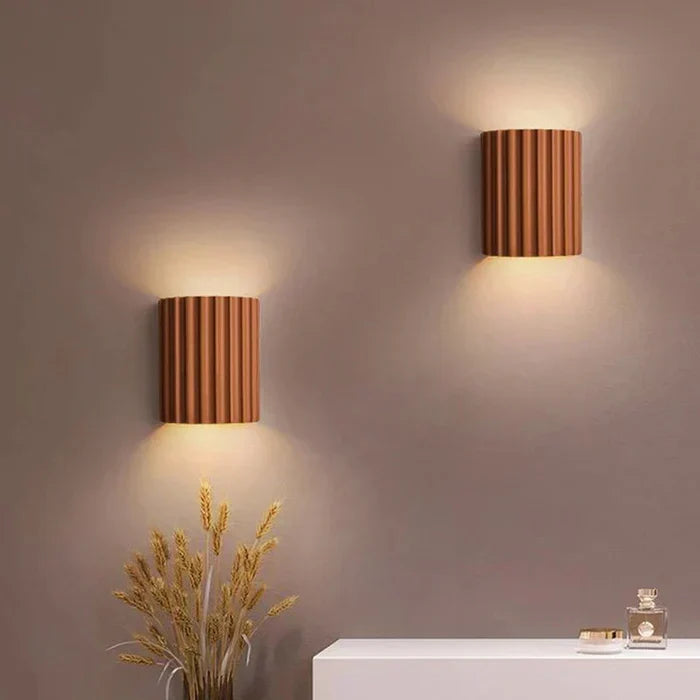 Contemporary wavy LED wall lamp, sleek design for modern interior decor in living rooms.