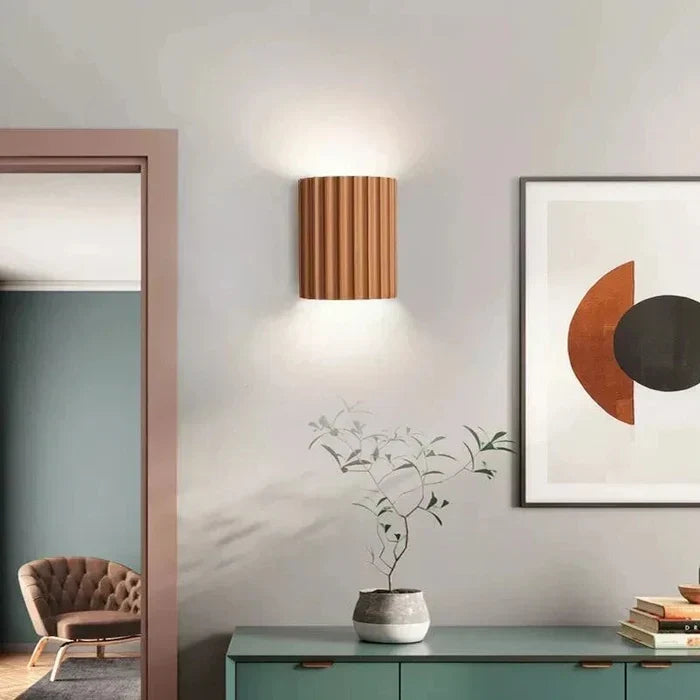 Energy-efficient LED wall lamp with unique wavy design, perfect for accent lighting & home decor.