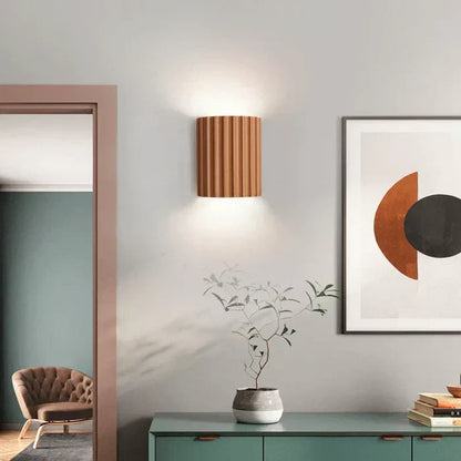 Stylish wavy LED wall lamp, contemporary home lighting enhances any modern living space.