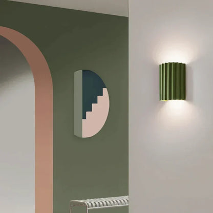 Unique wavy LED wall lamp, modern interior lighting offering artistic flair & ambient home decor.