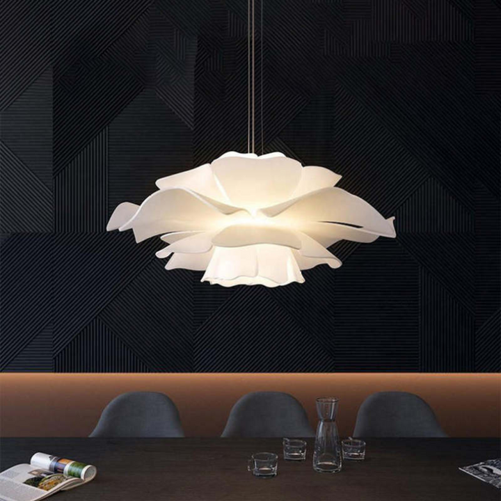 Elegant white metal flower pendant lamp. Modern lighting perfect for dining room or living room.