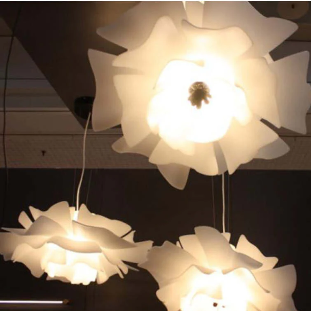 Artistic white metal flower pendant lamp, Sophia design. Adds a modern, elegant touch to your home.