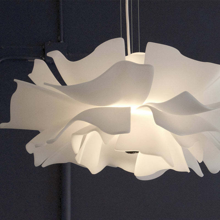 Chic white metal flower pendant lamp. Modern lighting, white finish, ideal for stylish interior design.