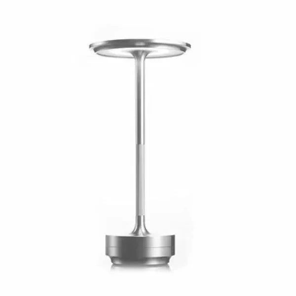 Sleek modern aluminum wireless dimmable LED desk lamp. Stylish portable light for any contemporary home decor.