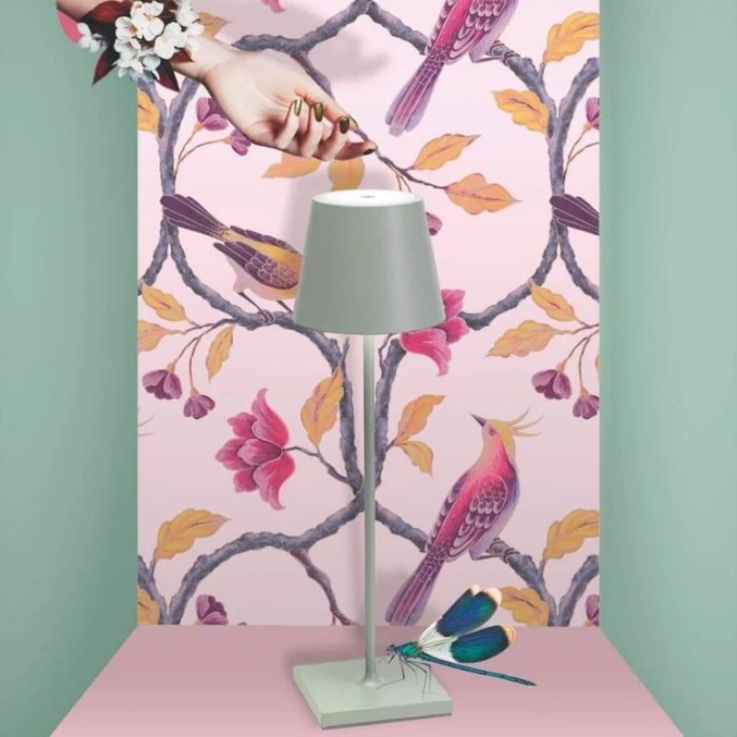 Portable LED table lamp with touch control, great for modern home decor.