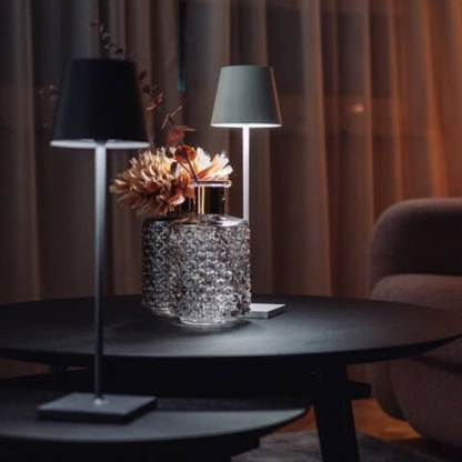 Wireless touch LED lamp for contemporary living spaces. Portable & elegant.