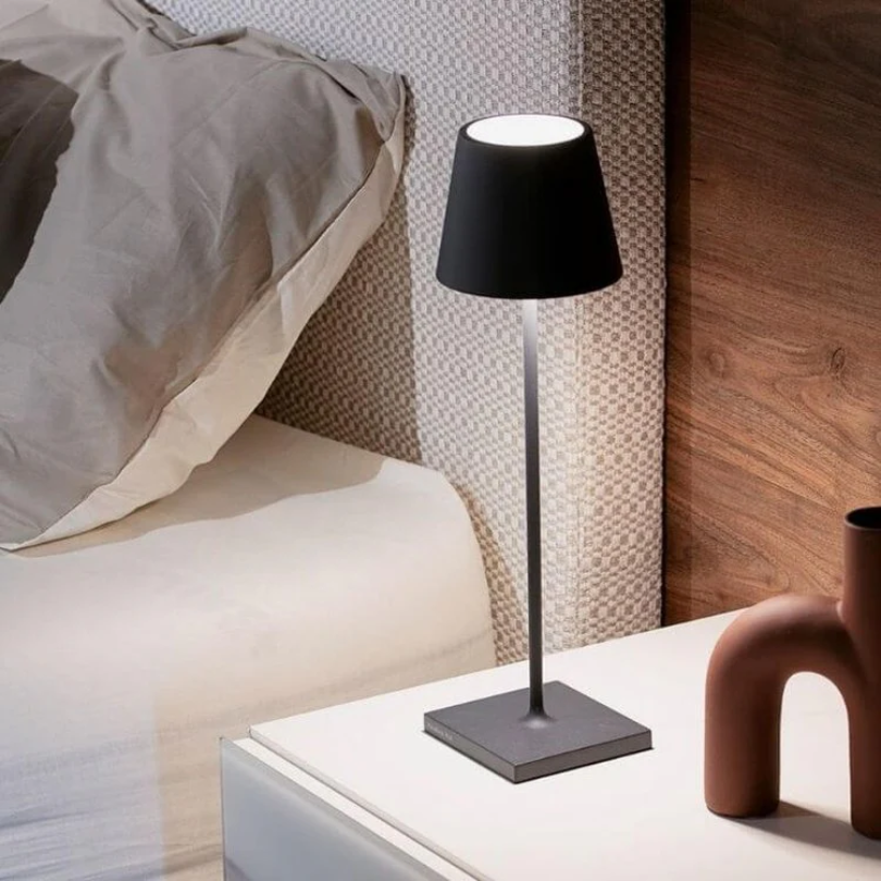 Touch-sensitive LED lamp for modern desks, portable & rechargeable.