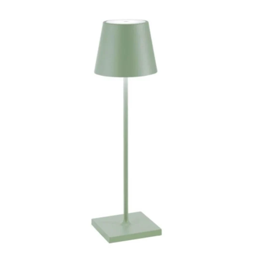 Sleek LED table lamp, wireless & rechargeable. Creates modern mood lighting.
