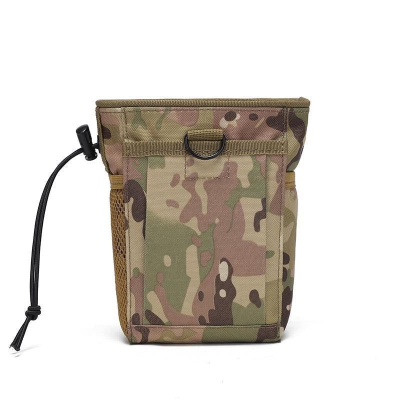 Versatile MOLLE dump pouch by a campfire, showing its use for general utility and outdoor essentials.