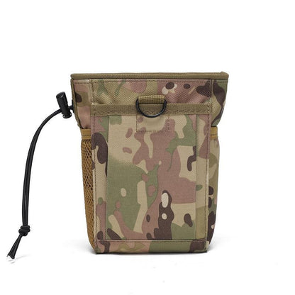 Versatile MOLLE dump pouch by a campfire, showing its use for general utility and outdoor essentials.