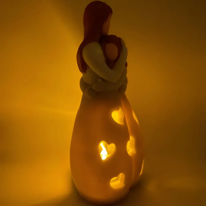 Elegant mother daughter candle holder, a heartwarming decorative figurine that celebrates family love and bonds.