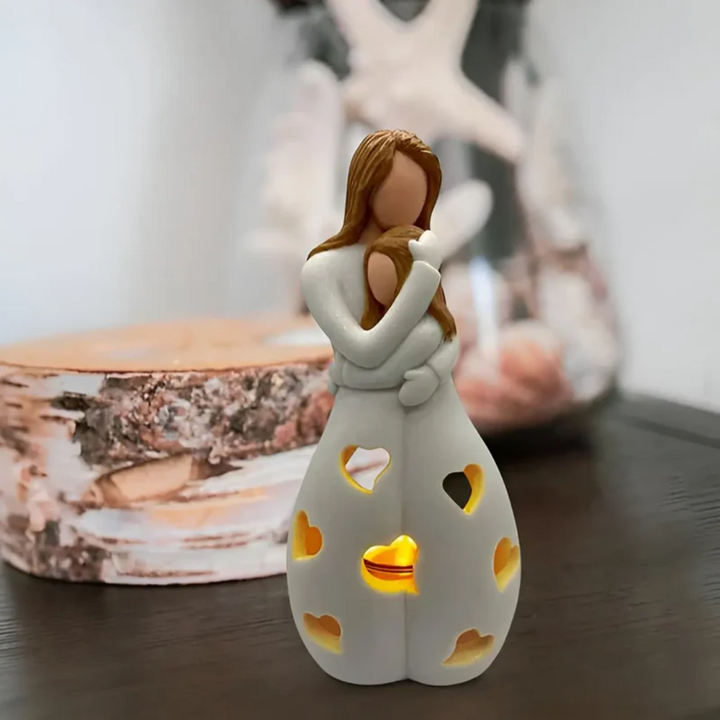 Mother and daughter hugging candle holder, a lovely home decor accent and a thoughtful gift for moms.