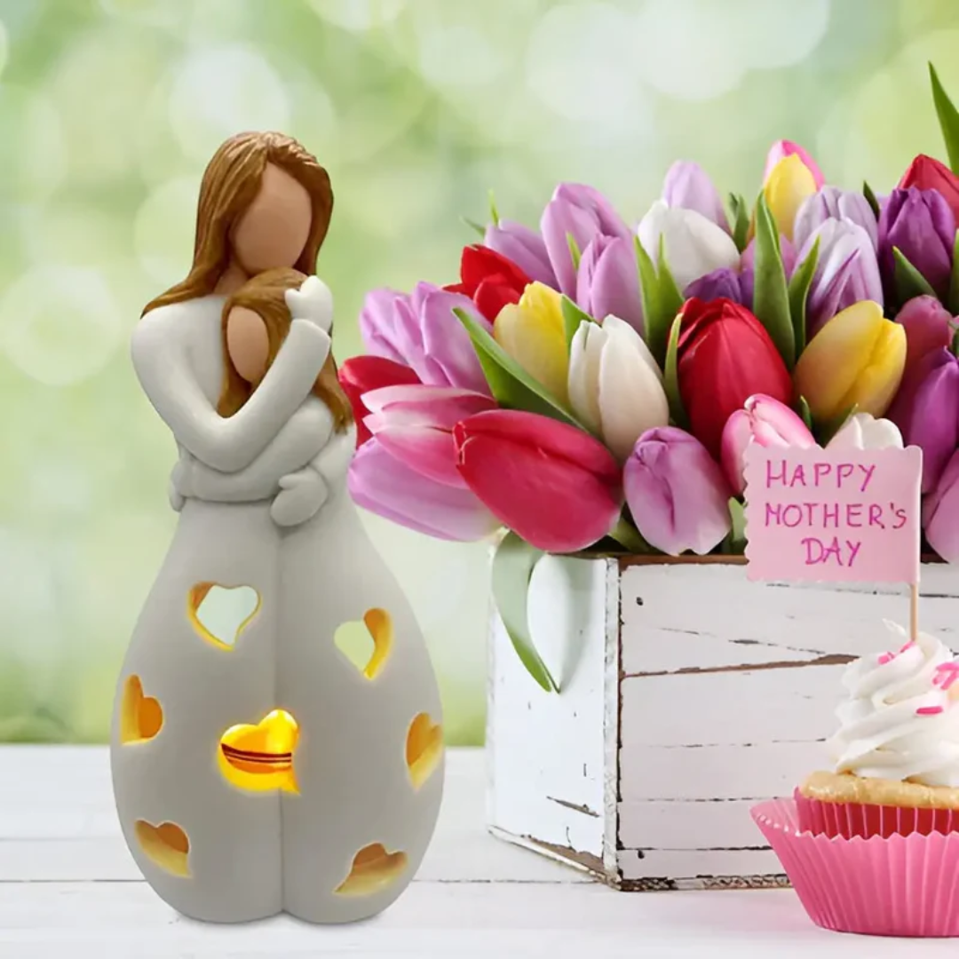 Ceramic mother daughter candle holder, depicting a loving embrace, perfect as a unique Mothers Day gift.