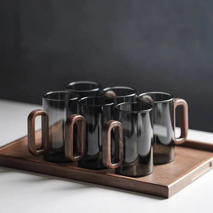 Unique mountain-inspired glass coffee mug. Alpine design, ideal for tea lovers & stylish home decor.