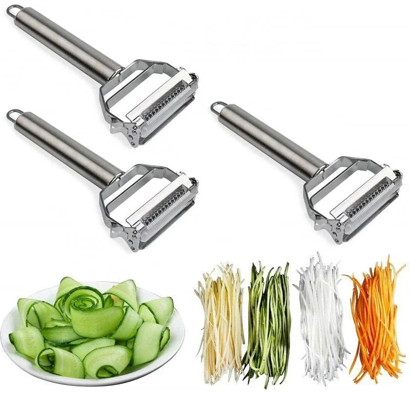 Sharp stainless steel julienne peeler expertly cutting carrot strips. Essential kitchen tool for quick meal prep.