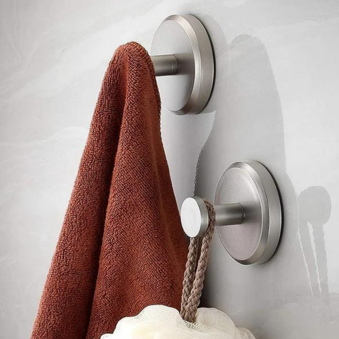 Durable, removable Instant Grip Suction Hooks for secure, tool-free home organization.