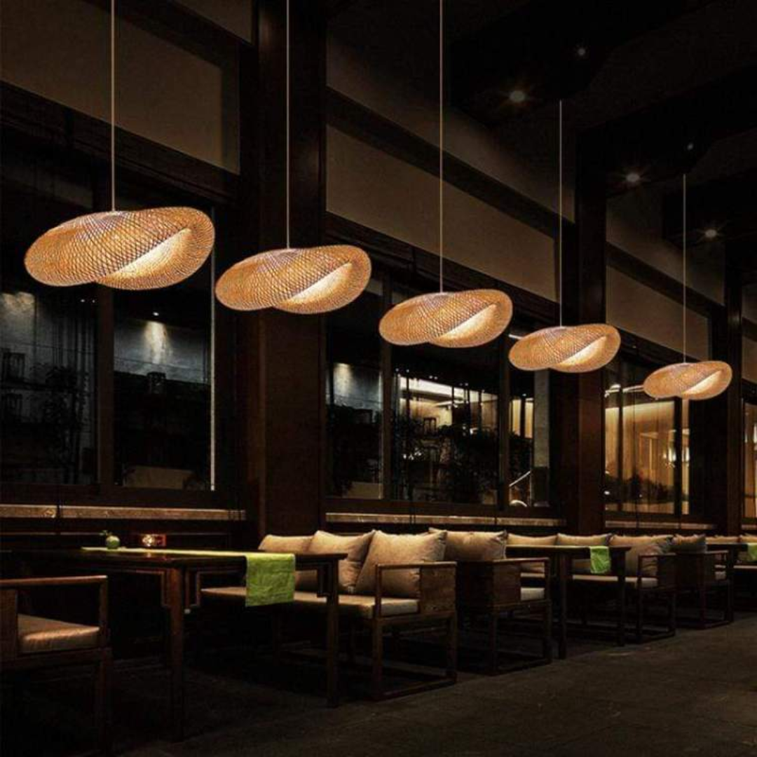 Living room bamboo ball LED pendant lamp. Natural, adjustable height lighting for modern eco-friendly homes.
