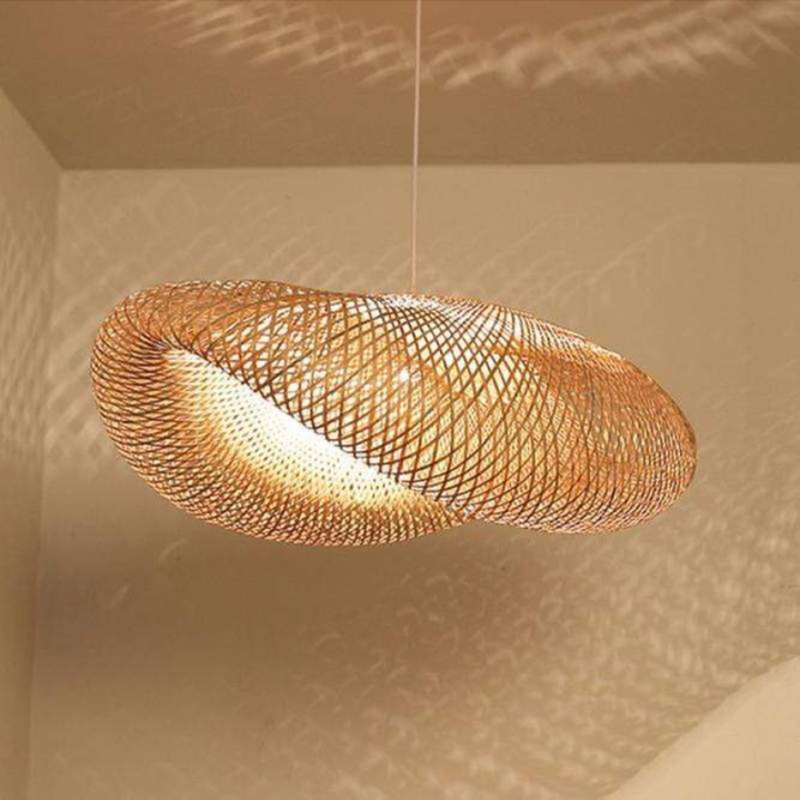 Warm glow from a natural bamboo ball LED pendant light, perfect for a cozy, modern dining room atmosphere.