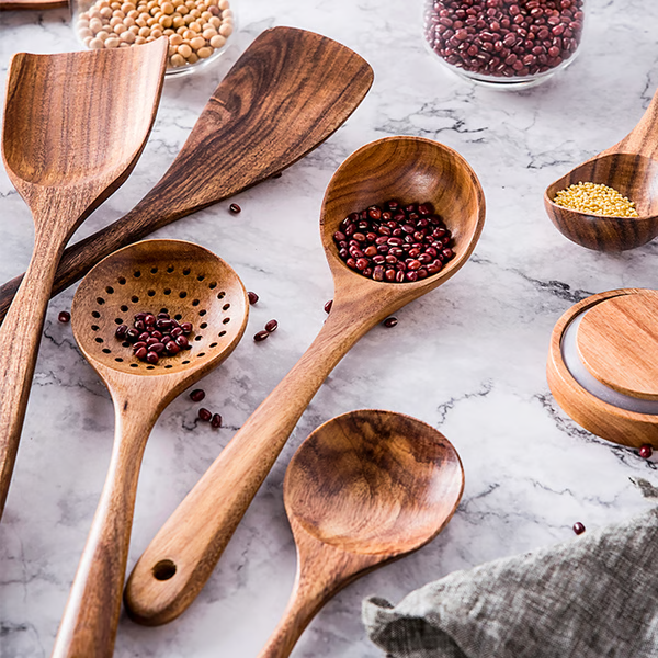 Durable teak wood cooking spoons & kitchen tools, scratch-proof & safe for all cookware.