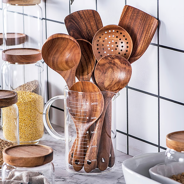 Premium teak wood kitchen utensil collection, natural wooden cooking spoons for everyday use.