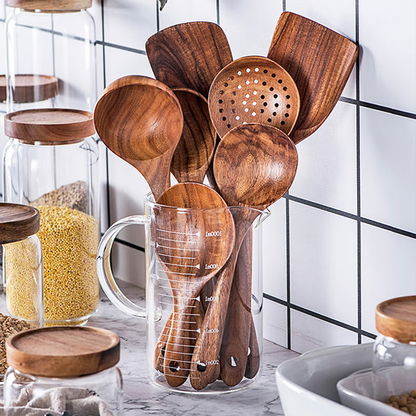 Premium teak wood kitchen utensil collection, natural wooden cooking spoons for everyday use.