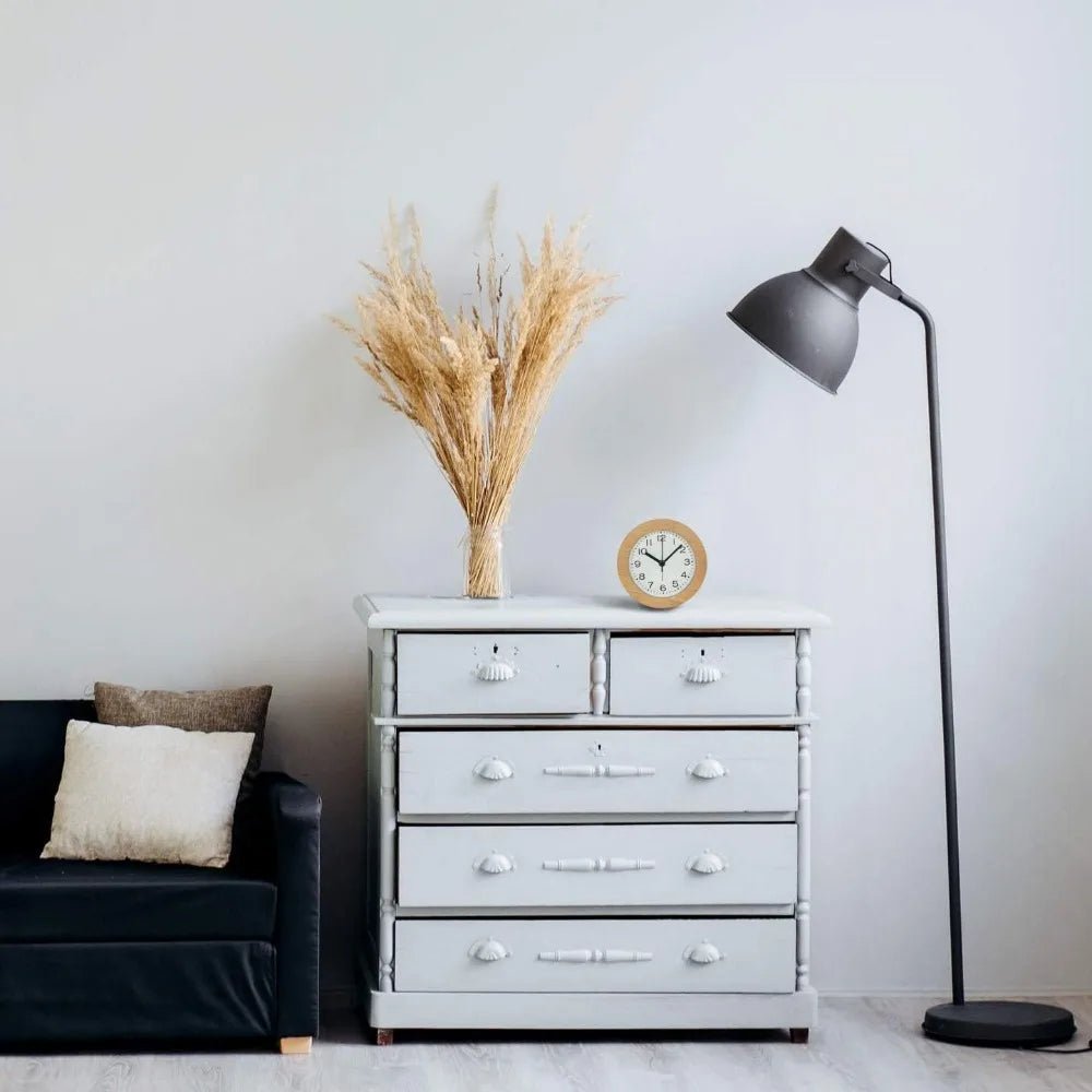 Natural wood digital alarm clock on a nightstand. Silent and modern, perfect for peaceful bedroom decor and wake-ups.