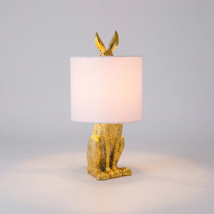 Charming masked animal accent lamp, Noctebelle. Modern whimsical resin table lamp for unique home decor.