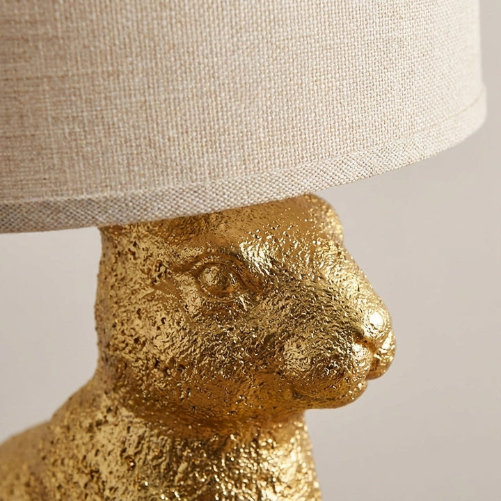 Decorative masked animal table lamp. Noctebelle resin accent lighting for modern bedroom and living room decor.