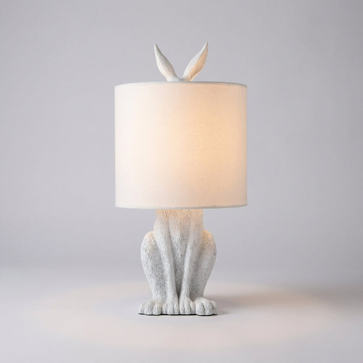 Unisex masked animal table lamp. Whimsical resin accent light, perfect modern animal decor for home spaces.