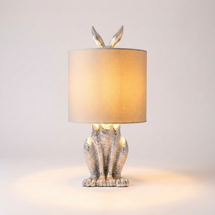 Resin masked animal accent lamp, Noctebelle. Unique modern table lamp for bedroom, living room, and home decor.