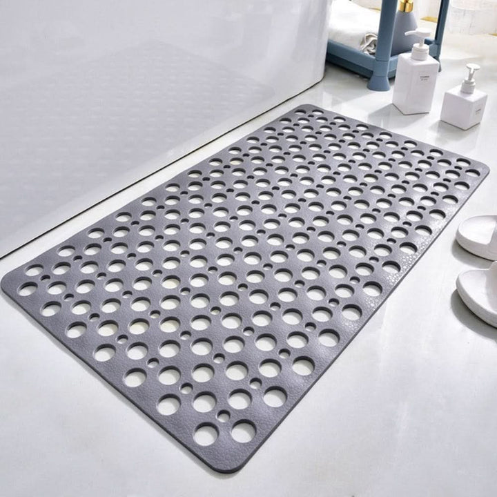 Non-slip shower mat with strong suction cups for enhanced bathroom safety & wet floor protection.