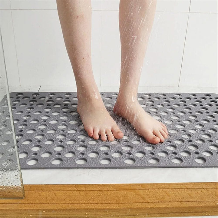 Unisex non-slip shower mat, a durable bath mat with powerful suction cups for ultimate bathroom safety.