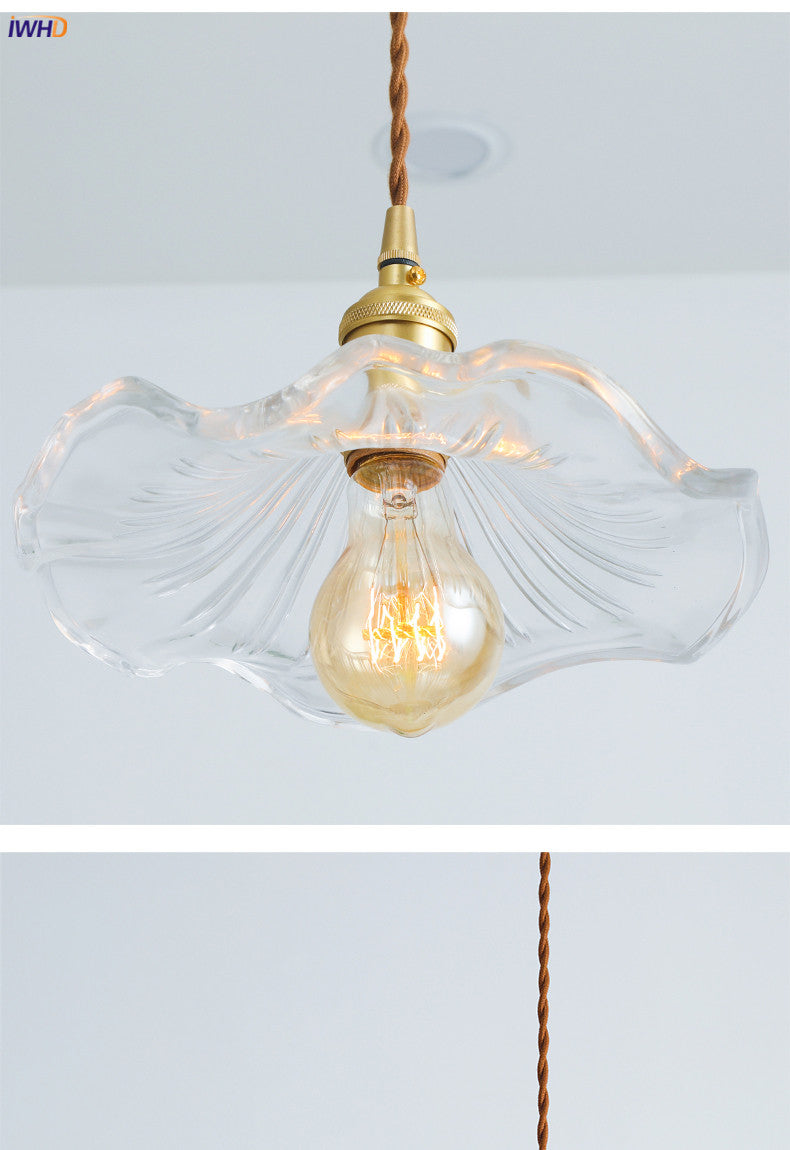 Contemporary glass & copper LED hanging light. Nordic style for bedroom or dining room ambiance.