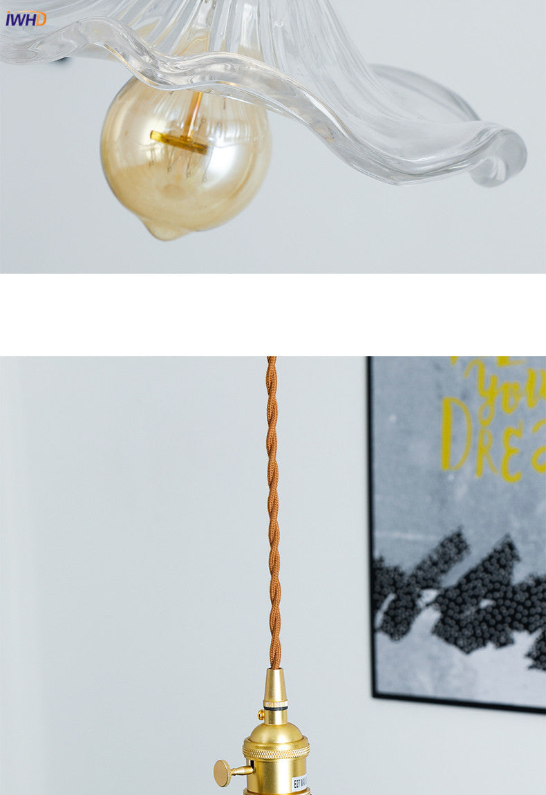 Sleek LED hanging lamp, pink glass & copper. Nordic design for a stylish and bright bedroom.