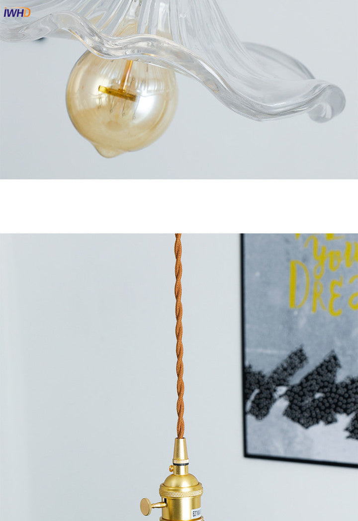 Sleek LED hanging lamp, pink glass & copper. Nordic design for a stylish and bright bedroom.
